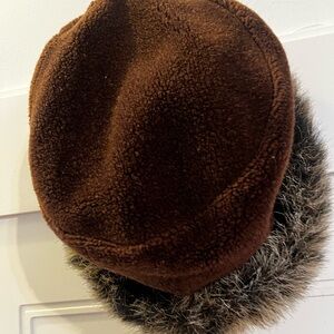 Watership Trading Company Hat in Brown with Faux Fur Trim.